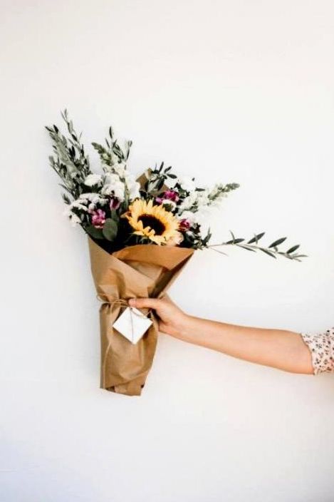 Student arranging flowers