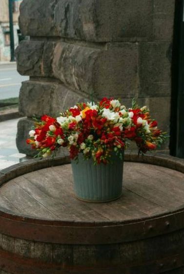 Retail florist arranging display
